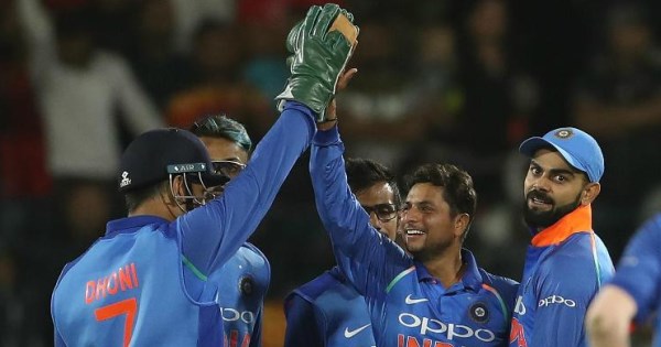 Kuldeep Yadav, MS Dhoni and Virat Kohli