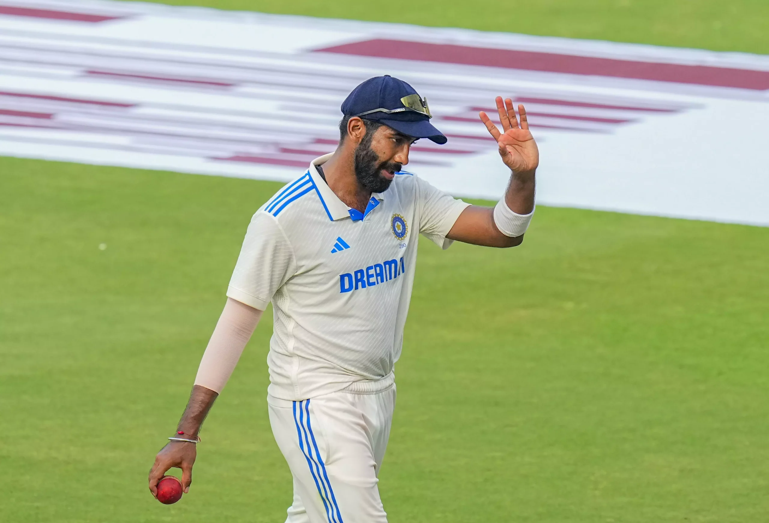 432666-jasprit-bumrah-waves-test
